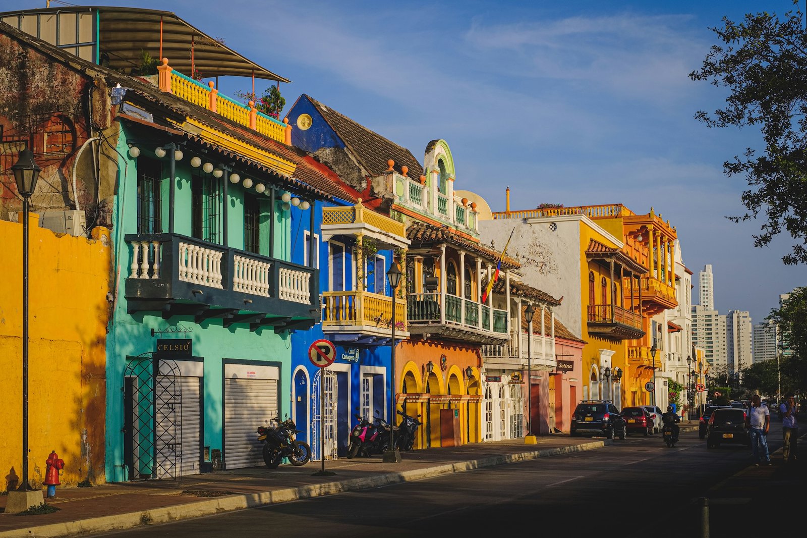 Colourful colonial façades lining a cobblestone street in Cartagena, Colombia