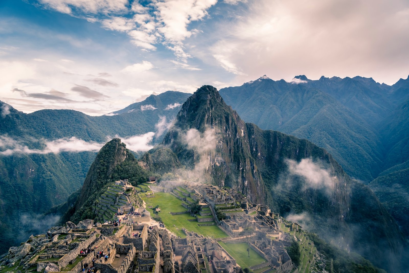 Machu Picchu Inca citadel with Huayna Picchu rising above the clouds, Peru